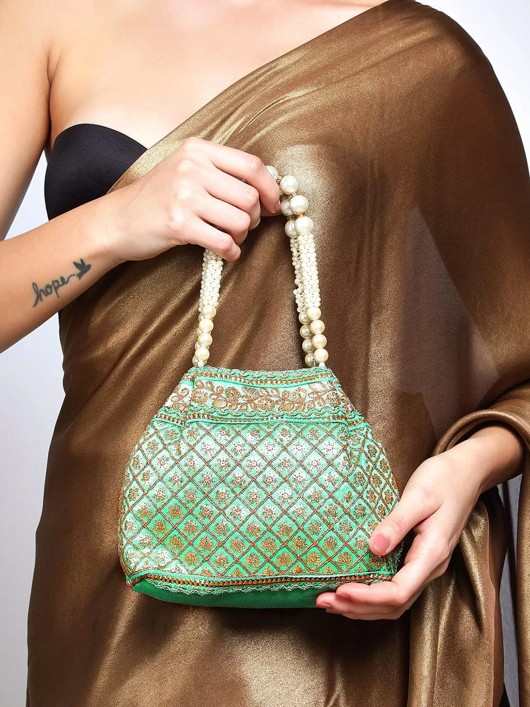 Rubans Women Green & Gold-Toned Embroidered Potli bag.